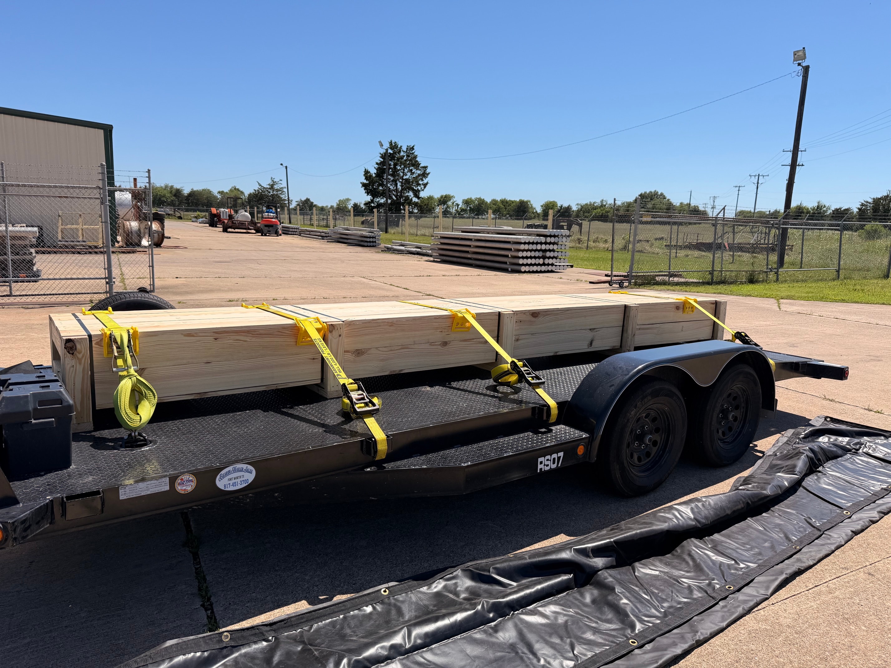 Utility trailer at industrial yard